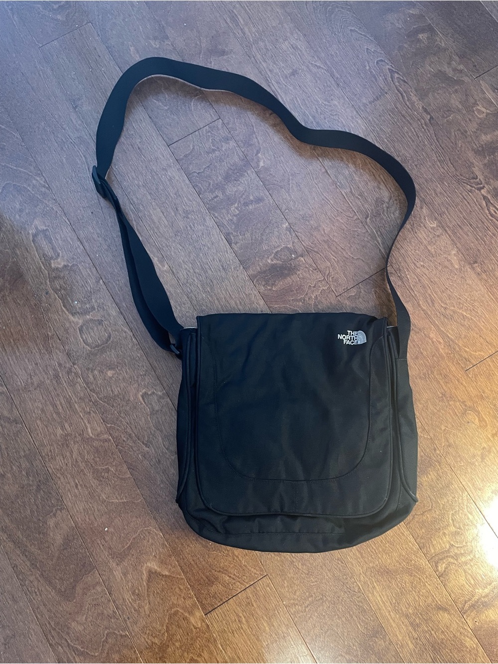 The North Face Black Messenger Bag with Adjustable Shoulder Strap